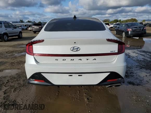 ✅ 2022 Hyundai Sonata Sport • VIN: 5NPEJ4J25NH136404 • Lot: 37618813. Wystawiony na Copart z przebiegiem 37 619 mil mil. Skorzystaj z bezpłatnego archiwum sprzedaży aukcyjnych z USA i zobacz szczegółowy raport historii pojazdu na DreamBid. Zdjęcie 6.