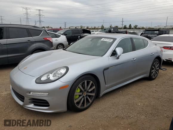 ✅ 2015 Porsche Panamera S E-Hybrid • VIN: WP0AD2A74FL040203 • Lot: 82415105. Listed on Copart with 40,208 mi. Free auction sales archive from the USA and detailed vehicle history report at DreamBid. Image 1.