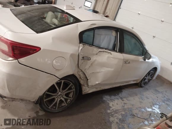 ✅ 2017 Subaru Impreza Limited • VIN: 4S3GKAU60H3605515 • Lot: 41390447. Listed on IAAI with 59,868 mi. Free auction sales archive from the USA and detailed vehicle history report at DreamBid. Image 13.