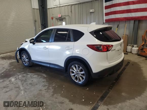 ✅ 2015 Mazda CX-5 Grand Touring • VIN: JM3KE2DY9F0442717 • Лот: 80021895. Опубликован ранее на Copart с пробегом 188 966 миль. Бесплатный доступ к архиву аукционных продаж из США и подробный отчёт об истории автомобиля на DreamBid. Изображение 2.
