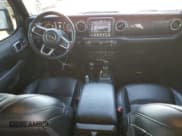 ✅ 2021 Jeep Wrangler Unlimited Sahara Altitude • VIN: 1C4HJXEN8MW736426 • Lot: 50145245. Listed on Copart with 30,938 mi. Free auction sales archive from the USA and detailed vehicle history report at DreamBid. Image 8.