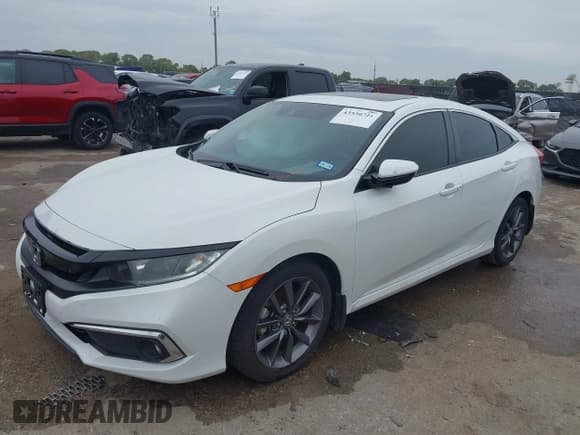✅ 2020 Honda Civic EX-L • VIN: 19XFC1F74LE012482 • Lot: 43530721. Listed on IAAI with 52,499 mi. Free auction sales archive from the USA and detailed vehicle history report at DreamBid. Image 17.