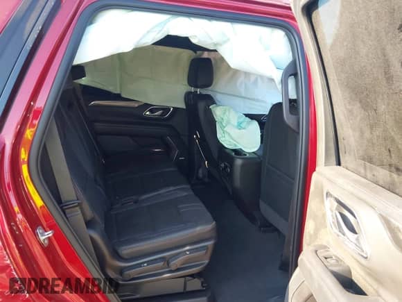 2021 Chevrolet Tahoe RST z VIN 1GNSKRKD0MR421104, wystawiony jako IAAI lot #43209576 z przebiegiem 93 123 mil mil oraz . Historia ofert i sprzedaży dostępna na DreamBid. Obrazek 8.