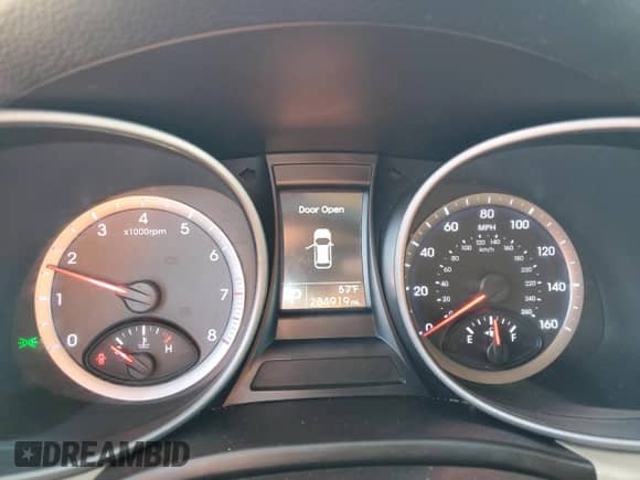 2015 Hyundai Santa Fe с VIN 5XYZU3LB2FG243581, выставлен на аукционе Copart как лот 90817795 с пробегом 284 919 миль миль и Списание • Salvage title. История ставок и продаж доступна на DreamBid. Изображение 9.