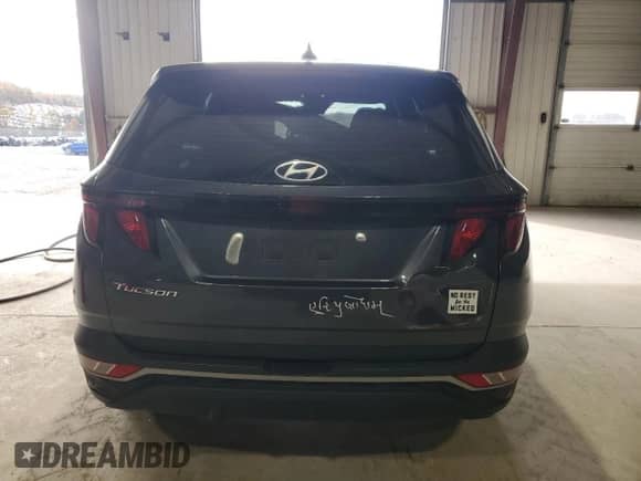 2022 Hyundai Tucson SE with VIN 5NMJA3AE5NH052759, listed as a Copart auction lot 90626665 with 58,295 mi miles and Salvage title. Bid and sale history available at DreamBid. Image 6.