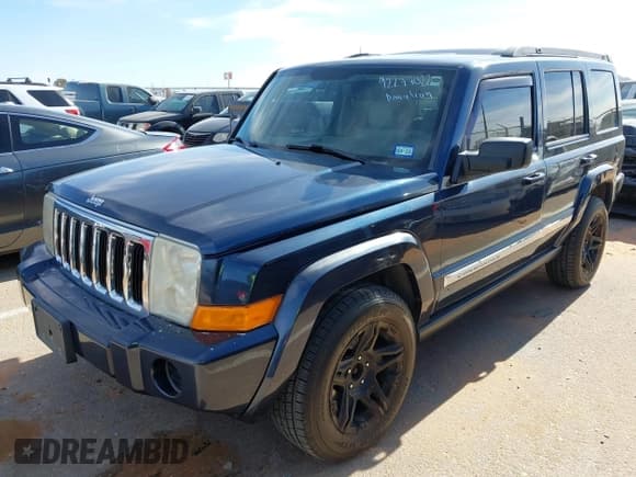 ✅ 2009 Jeep Commander Sport • VIN: 1J8HG48K49C500646 • Lot: 42277022. Listed on IAAI with 142,242 mi. Free auction sales archive from the USA and detailed vehicle history report at DreamBid. Image 2.