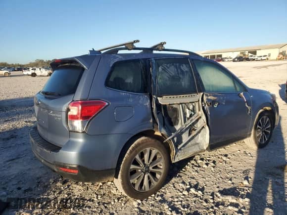 2018 Subaru Forester Touring с VIN JF2SJGWC4JH535224, выставлен на аукционе Copart как лот 86684145 с пробегом 100 969 миль миль и Списание • Salvage title. История ставок и продаж доступна на DreamBid. Изображение 3.