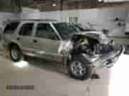 1999 Chevrolet Blazer LS with VIN 1GNDT13W9X2105768, listed as a Copart auction lot 80141174 with 193,804 mi miles and Salvage title. Bid and sale history available at DreamBid. Image 4.