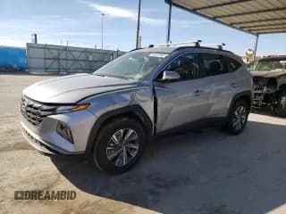 ✅ 2022 Hyundai Tucson Blue • VIN: KM8JBCA10NU029131 • Lot: 69291932. Wystawiony na Copart z przebiegiem 31 876 mil. Bezpłatny archiwum sprzedaży aukcyjnych z USA i szczegółowy raport historii pojazdu na DreamBid. Zdjęcie 1.