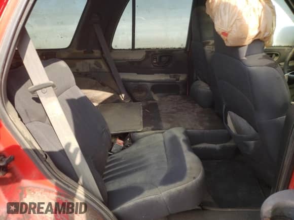 2003 Chevrolet Blazer LS z VIN 1GNDT13X83K135413, wystawiony jako Copart lot #71185894 z przebiegiem Nie podano mil oraz Szkoda całkowita • Salvage title. Historia ofert i sprzedaży dostępna na DreamBid. Obrazek 11.