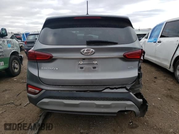 ✅ 2019 Hyundai Santa Fe SE • VIN: 5NMS2CAD1KH031282 • Lot: 75263393. Wystawiony na Copart z przebiegiem 72 069 mil. Bezpłatny archiwum sprzedaży aukcyjnych z USA i szczegółowy raport historii pojazdu na DreamBid. Zdjęcie 6.