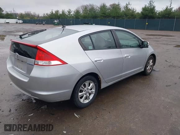 ✅ 2010 Honda Insight LX • VIN: JHMZE2H54AS029462 • Lot: 43806001. Listed on IAAI with 121,625 mi. Free auction sales archive from the USA and detailed vehicle history report at DreamBid. Image 4.