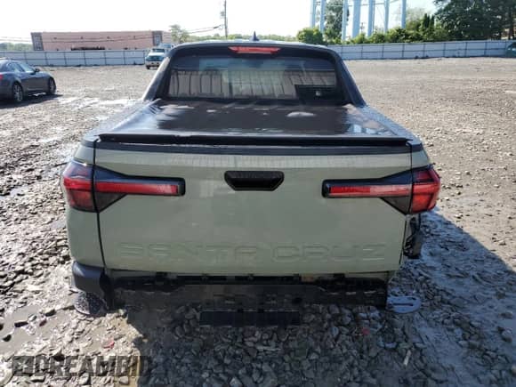 2023 Hyundai Santa Cruz SE with VIN 5NTJA4AE6PH057806, listed as a Copart auction lot 61588465 with 26,686 mi miles and Salvage title. Bid and sale history available at DreamBid. Image 6.