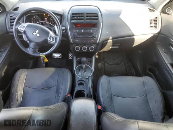 2013 Mitsubishi Outlander LE with VIN 4A4AP5AU0DE022676, listed as a Copart auction lot 86818835 with 221,484 mi miles and Salvage title. Bid and sale history available at DreamBid. Image 8.