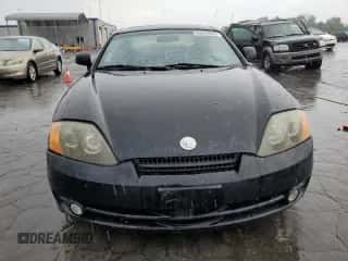 2004 Hyundai Tiburon GT с VIN KMHHN65F04U116247, выставлен на аукционе Copart как лот 64578955 с пробегом 238 388 миль миль и Списание • Salvage title. История ставок и продаж доступна на DreamBid. Изображение 5.