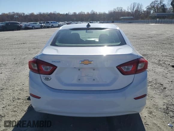 ✅ 2018 Chevrolet Cruze LS • VIN: 1G1BC5SMXJ7240543 • Lot: 92471875. Listed on Copart with 97,512 mi. Free auction sales archive from the USA and detailed vehicle history report at DreamBid. Image 6.