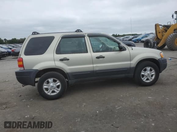 ✅ 2003 Ford Escape XLT Popular 2 • VIN: 1FMYU93173KB79464 • Lot: 67105015. Wystawiony na Copart z przebiegiem 87 593 mil. Bezpłatny archiwum sprzedaży aukcyjnych z USA i szczegółowy raport historii pojazdu na DreamBid. Zdjęcie 3.