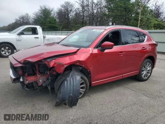 ✅ 2023 Mazda CX-5 Signature • VIN: JM3KFBXY9P0262213 • Lot: 62659365. Listed on Copart with 26,461 mi. Free auction sales archive from the USA and detailed vehicle history report at DreamBid. Image 1.