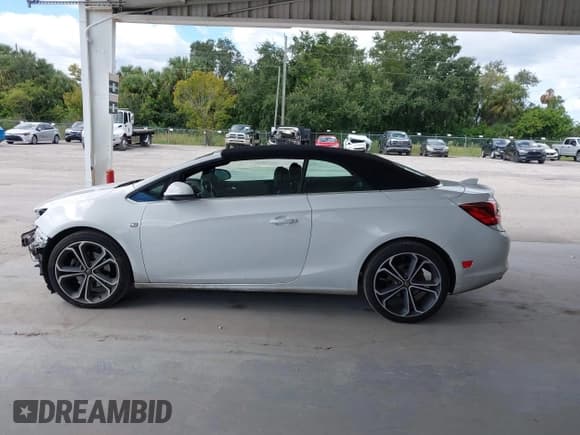 ✅ 2016 Buick Cascada Premium • VIN: W04WT3N50GG054112 • Lot: 43458520. Listed on IAAI with 136,691 mi. Free auction sales archive from the USA and detailed vehicle history report at DreamBid. Image 15.