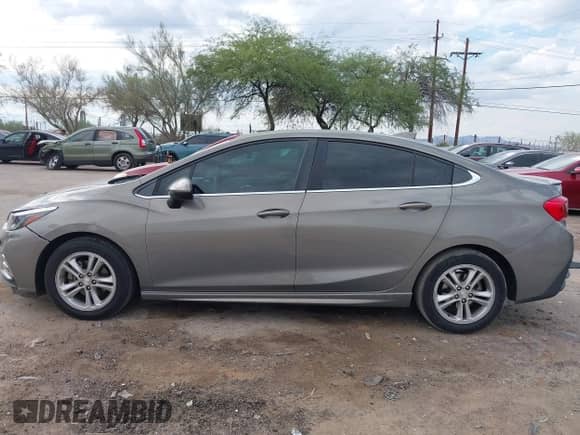 2017 Chevrolet Cruze LT with VIN 1G1BE5SMXH7215310, listed as a IAAI auction lot 43400905 with 129,073 mi miles and . Bid and sale history available at DreamBid. Image 14.