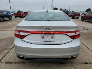 2015 Hyundai Azera z VIN KMHFG4JG6FA448735, wystawiony jako Copart lot #79897064 z przebiegiem 151 499 mil mil oraz Czysty tytuł • Clean title. Historia ofert i sprzedaży dostępna na DreamBid. Obrazek 6.