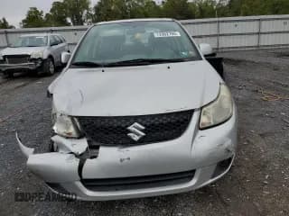 ✅ 2009 Suzuki SX4 FWD • VIN: JS2YC412396201554 • Lot: 72902194. Wystawiony na Copart z przebiegiem 135 355 mil. Bezpłatny archiwum sprzedaży aukcyjnych z USA i szczegółowy raport historii pojazdu na DreamBid. Zdjęcie 5.