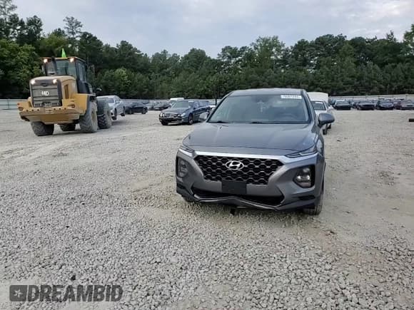 ✅ 2019 Hyundai Santa Fe SE • VIN: 5NMS23AD6KH092076 • Lot: 70301244. Wystawiony na Copart z przebiegiem 120 644 mil. Bezpłatny archiwum sprzedaży aukcyjnych z USA i szczegółowy raport historii pojazdu na DreamBid. Zdjęcie 12.