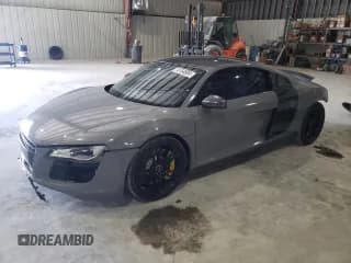 ✅ 2009 Audi R8 4.2L • VIN: WUAAU34279N002238 • Lot: 74154804. Wystawiony na Copart z przebiegiem 71 425 mil. Bezpłatny archiwum sprzedaży aukcyjnych z USA i szczegółowy raport historii pojazdu na DreamBid. Zdjęcie 1.
