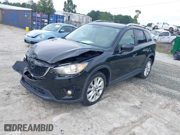 ✅ 2013 Mazda CX-5 Grand Touring • VIN: JM3KE2DEXD0123930 • Лот: 42938878. Опубликован ранее на IAAI с пробегом 158 782 миль. Бесплатный доступ к архиву аукционных продаж из США и подробный отчёт об истории автомобиля на DreamBid. Изображение 2.