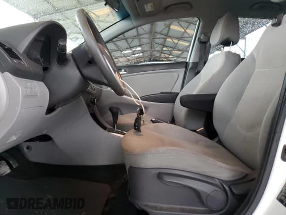 ✅ 2013 Hyundai Accent GS • VIN: KMHCT5AE1DU126826 • Lot: 82784305. Listed on Copart with 98,800 mi. Free auction sales archive from the USA and detailed vehicle history report at DreamBid. Image 7.