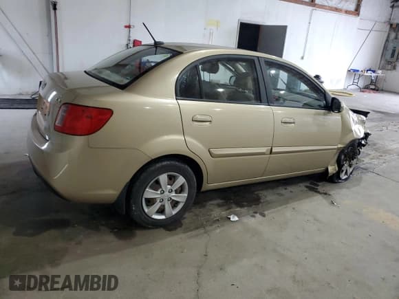 ✅ 2011 Kia Rio LX • VIN: KNADH4A37B6943512 • Лот: 85410505. Опубликован ранее на Copart с пробегом 138 943 миль. Бесплатный доступ к архиву аукционных продаж из США и подробный отчёт об истории автомобиля на DreamBid. Изображение 3.
