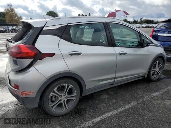 2018 Chevrolet Bolt EV Premier with VIN 1G1FX6S01J4134041, listed as a Copart auction lot 82892843 with 79,703 mi miles and . Bid and sale history available at DreamBid. Image 3.