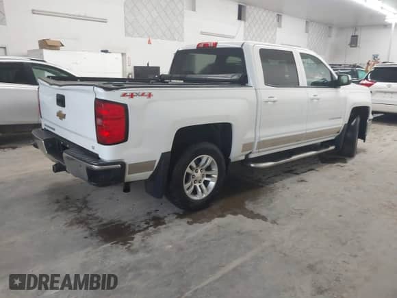 2015 Chevrolet Silverado 1500 LT z VIN 3GCUKREC5FG457751, wystawiony jako IAAI lot #42864420 z przebiegiem 133 732 mil mil oraz . Historia ofert i sprzedaży dostępna na DreamBid. Obrazek 4.