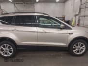 ✅ 2017 Ford Escape SE • VIN: 1FMCU9GD9HUC55311 • Lot: 43468403. Listed on IAAI with 117,889 mi. Free auction sales archive from the USA and detailed vehicle history report at DreamBid. Image 14.