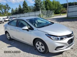 ✅ 2018 Chevrolet Cruze LS • VIN: 1G1BC5SM1J7205440 • Lot: 66359193. Listed on Copart with 15,435 mi. Free auction sales archive from the USA and detailed vehicle history report at DreamBid. Image 4.