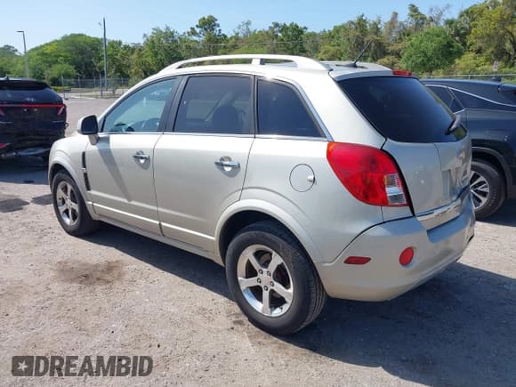 ✅ 2013 Chevrolet Captiva Sport LT • VIN: 3GNAL3EK4DS557197 • Lot: 42011329. Wystawiony na IAAI z przebiegiem 164 539 mil. Bezpłatny archiwum sprzedaży aukcyjnych z USA i szczegółowy raport historii pojazdu na DreamBid. Zdjęcie 3.