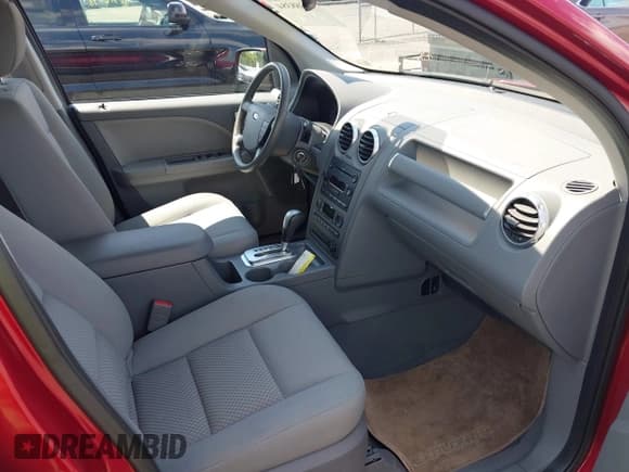 ✅ 2005 Ford Freestyle SEL • VIN: 1FMZK05135GA23270 • Лот: 42388384. Опубликован ранее на IAAI с пробегом 91 559 миль. Бесплатный доступ к архиву аукционных продаж из США и подробный отчёт об истории автомобиля на DreamBid. Изображение 5.