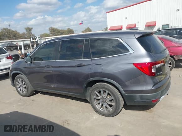 ✅ 2019 Honda Pilot EX-L • VIN: 5FNYF5H43KB005056 • Lot: 40729093. Wystawiony na IAAI z przebiegiem 78 339 mil. Bezpłatny archiwum sprzedaży aukcyjnych z USA i szczegółowy raport historii pojazdu na DreamBid. Zdjęcie 14.