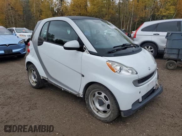 ✅ 2012 Smart fortwo Pure • VIN: WMEEJ3BA5CK573299 • Lot: 86857175. Listed on Copart with 71,721 mi. Free auction sales archive from the USA and detailed vehicle history report at DreamBid. Image 4.