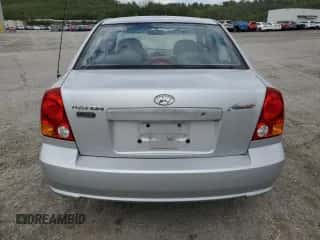 2004 Hyundai Accent GL с VIN KMHCG45C94U515186, выставлен на аукционе Copart как лот 52697284 с пробегом 49 236 миль миль и Списание • Salvage title. История ставок и продаж доступна на DreamBid. Изображение 6.