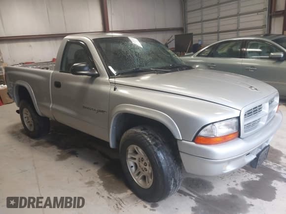 ✅ 2001 Dodge Dakota • VIN: 1B7GG26X21S118759 • Lot: 41943297. Wystawiony na IAAI z przebiegiem 156 372 mil. Bezpłatny archiwum sprzedaży aukcyjnych z USA i szczegółowy raport historii pojazdu na DreamBid. Zdjęcie 1.