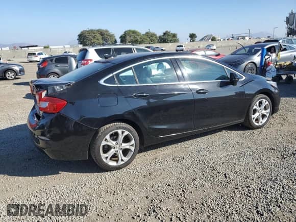 2016 Chevrolet Cruze Premier с VIN 1G1BG5SM1G7324635, выставлен на аукционе Copart как лот 82767675 с пробегом 164 228 миль миль и Списание • Salvage title. История ставок и продаж доступна на DreamBid. Изображение 3.