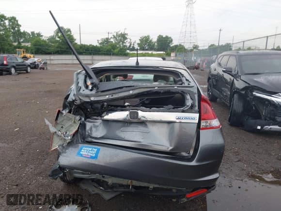 ✅ 2014 Honda Insight LX • VIN: JHMZE2H54ES000081 • Lot: 42622054. Listed on IAAI with 30,097 mi. Free auction sales archive from the USA and detailed vehicle history report at DreamBid. Image 17.