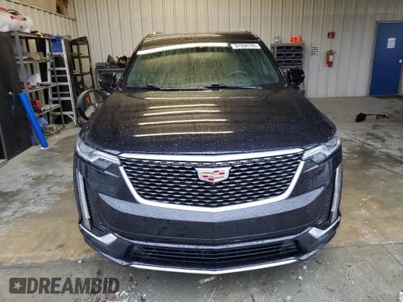 ✅ 2020 Cadillac XT6 FWD Premium Luxury • VIN: 1GYKPCRS4LZ154196 • Lot: 81938785. Wystawiony na Copart z przebiegiem 58 961 mil. Bezpłatny archiwum sprzedaży aukcyjnych z USA i szczegółowy raport historii pojazdu na DreamBid. Zdjęcie 5.