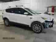 2017 Ford Escape Titanium с VIN 1FMCU9J96HUC05437, выставлен на аукционе Copart как лот 80256605 с пробегом 175 408 миль миль и Списание • Salvage title. История ставок и продаж доступна на DreamBid. Изображение 4.