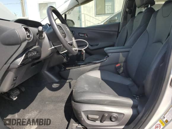 2022 Toyota Prius L Eco с VIN JTDKAMFUXN3188880, выставлен на аукционе Copart как лот 80854995 с пробегом 60 303 миль миль и Списание • Salvage title. История ставок и продаж доступна на DreamBid. Изображение 7.