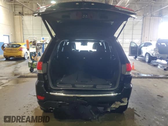 ✅ 2015 Jeep Grand Cherokee Overland • VIN: 1C4RJFCG8FC732562 • Lot: 46518865. Listed on Copart with 70,875 mi. Free auction sales archive from the USA and detailed vehicle history report at DreamBid. Image 6.