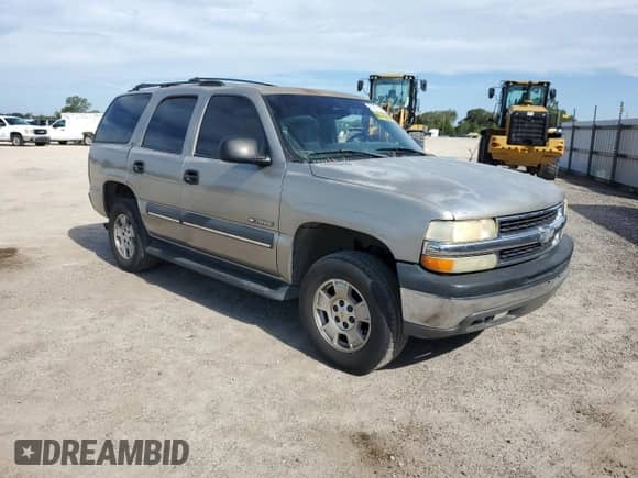 2002 Chevrolet Tahoe LT с VIN 1GNEC13Z52J169562, выставлен на аукционе Copart как лот 81831655 с пробегом Не указан миль и Списание • Salvage title. История ставок и продаж доступна на DreamBid. Изображение 4.