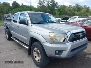 ✅ 2015 Toyota Tacoma PreRunner • VIN: 5TFKU4HN2FX005981 • Lot: 43316223. Listed on IAAI with 218,818 mi. Free auction sales archive from the USA and detailed vehicle history report at DreamBid. Image 1.