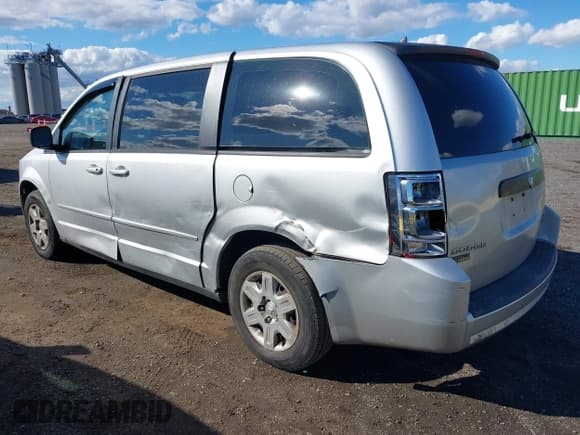 ✅ 2010 Dodge Grand Caravan SE • VIN: 2D4RN4DE5AR318969 • Lot: 43513600. Listed on IAAI with 164,143 mi. Free auction sales archive from the USA and detailed vehicle history report at DreamBid. Image 3.